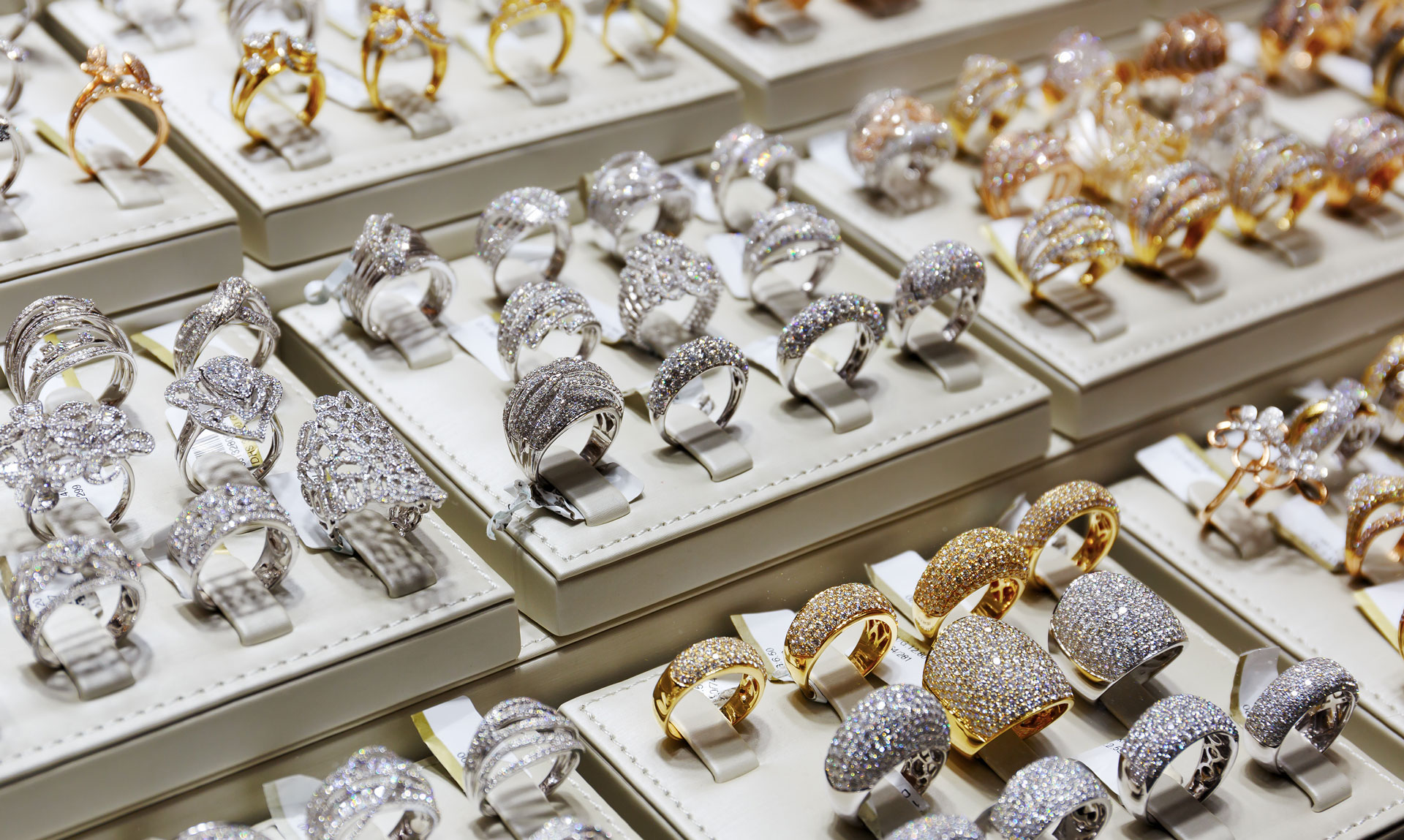 mixture of gold and diamond jewelry on display