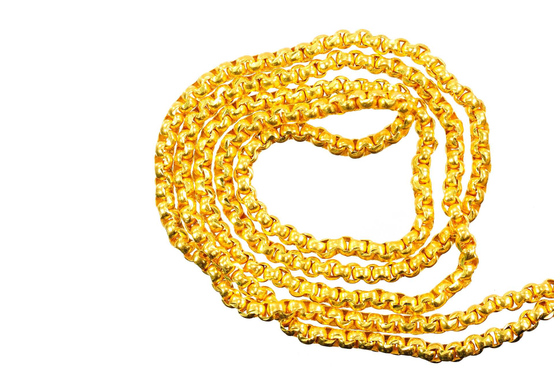 Gold necklace placed in a spiral shape