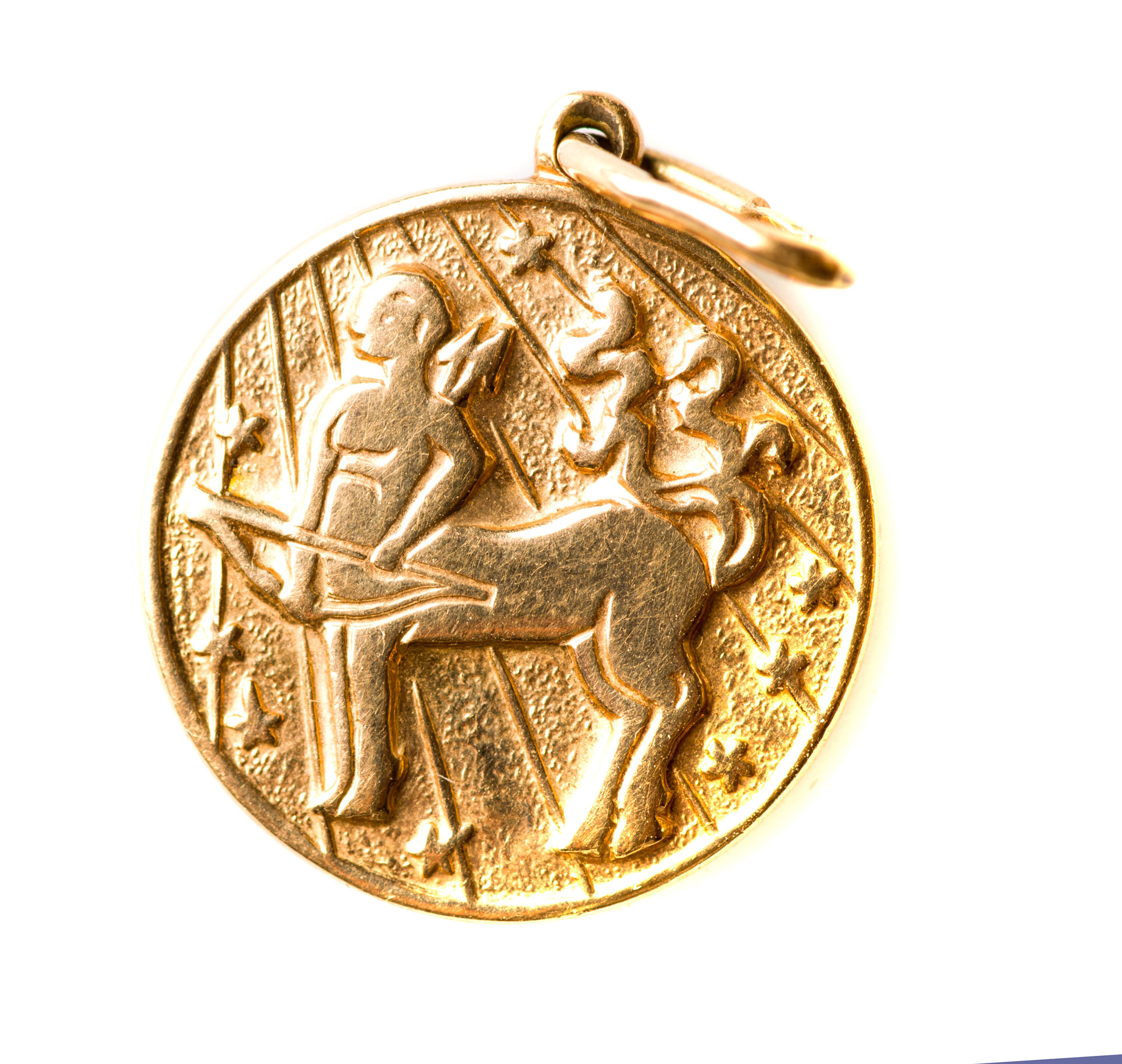 gold jewelry with centaur figure