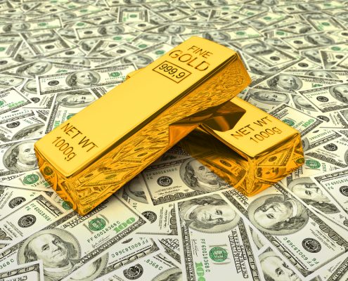 Gold bars on dollars