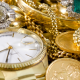 Should I Only Sell My Gold to a Buyer with XRF? - closeup of gold watch, rings, chains, bracelets, and coins