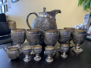 Peruvian Silver pitcher and cups